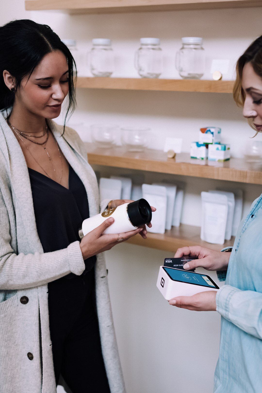 celebrity holding product